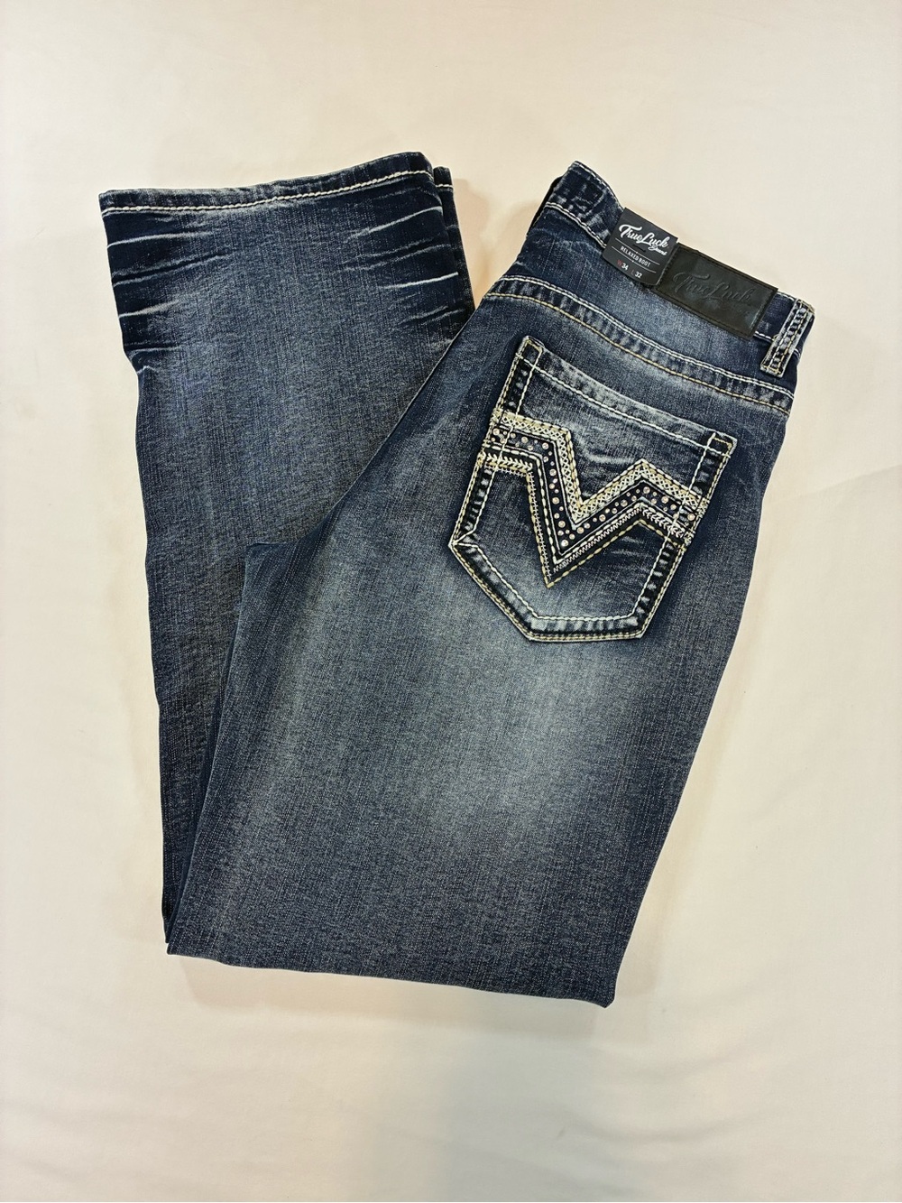 Relaxed Fit Men's Jeans in Dark Blue with Embellished Back Pocket